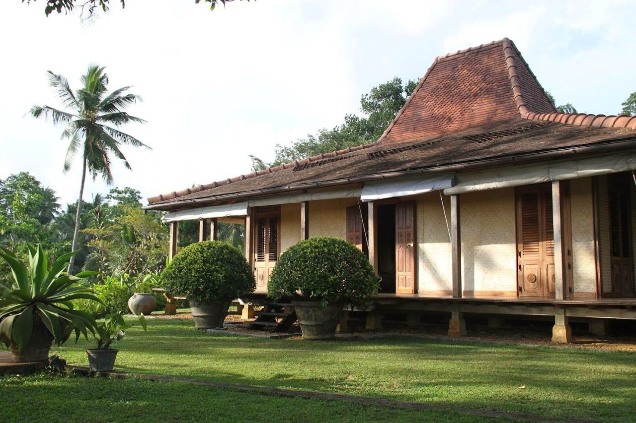 A stylish small hotel above a warm palm fringed bay on the south coast of Sri Lanka
