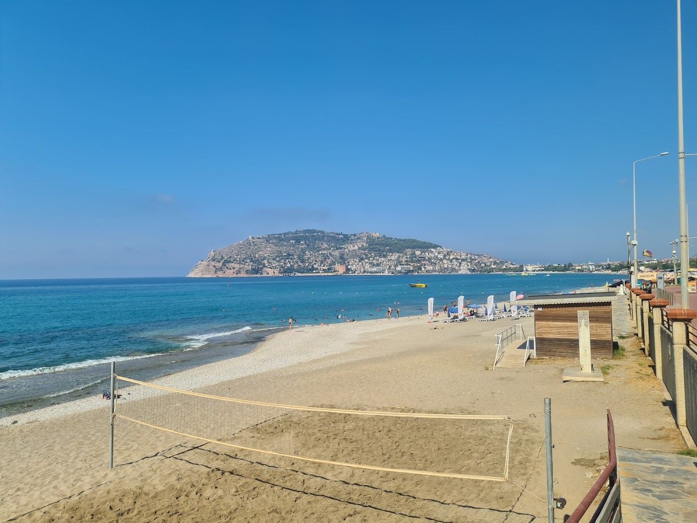 Palm lined Portakal Beach on the harbour side of the Alanya headland