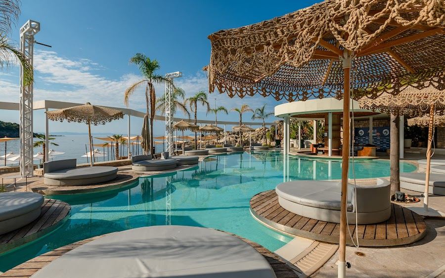 Pools and private beach at Folie Marine beach club on Jale beach in Albania