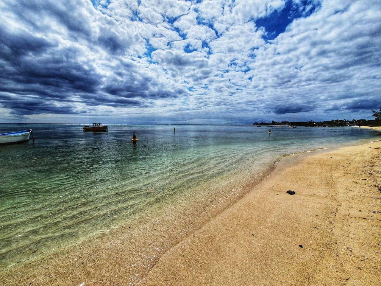 A second view of the rocky and sandy shore at Albion on the west coast of Mauritius