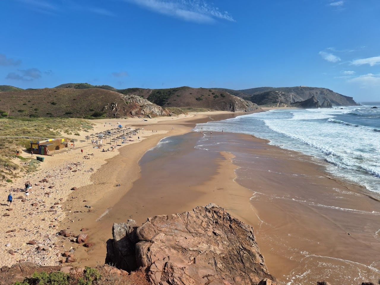 Atlantic light over the cliffs and surf at Praia do Amado on the west coast of the Algarve