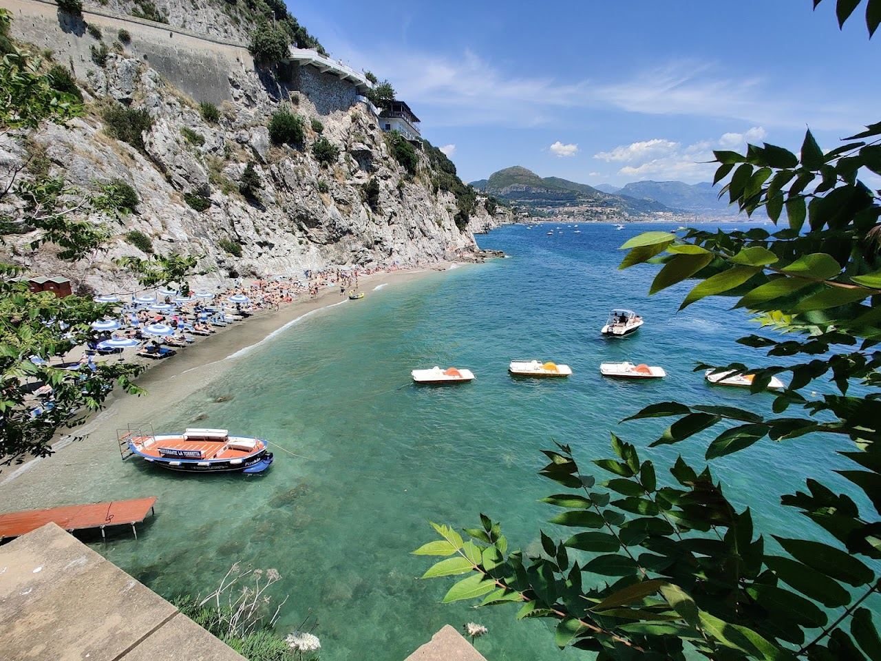 Colourful fishing boats on the free public beach at Cetara on the eastern Amalfi Coast