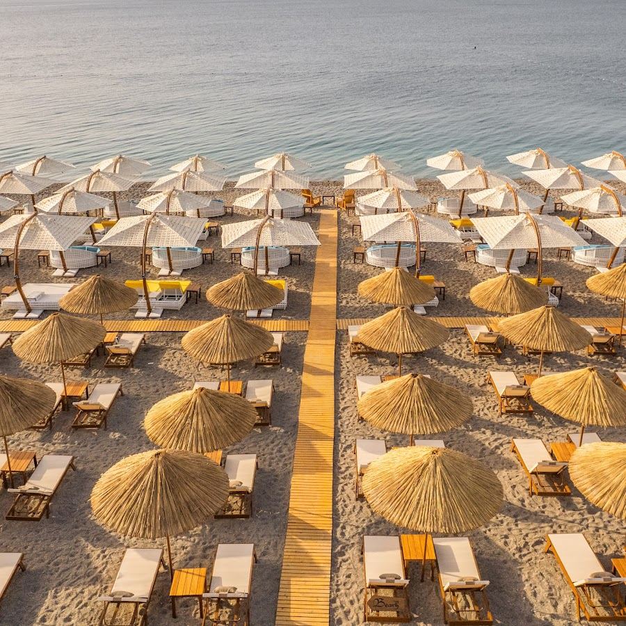 Sun loungers and beach bar at Kalypso Beach Club on Konyaalti beach in Antalya