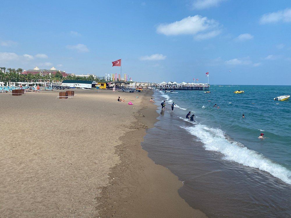 Beach clubs and loungers along the Lara Beach resort strip in Antalya