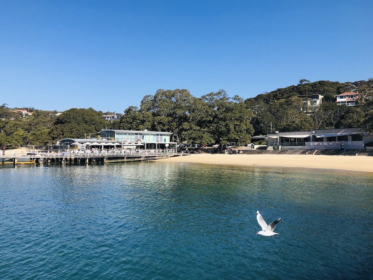 The calm harbour crescent and rotunda at Balmoral Beach in Sydney