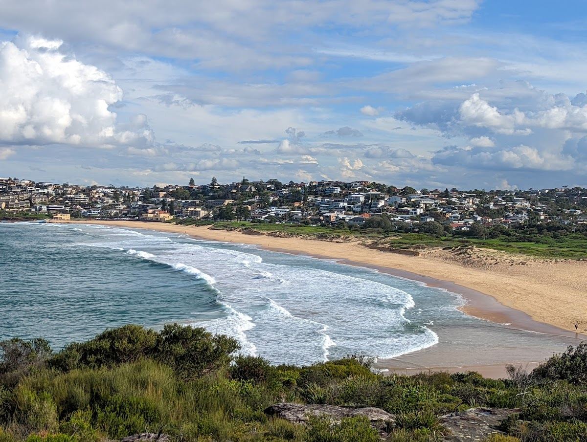 The long dune backed sand and lagoon at Curl Curl in Sydney