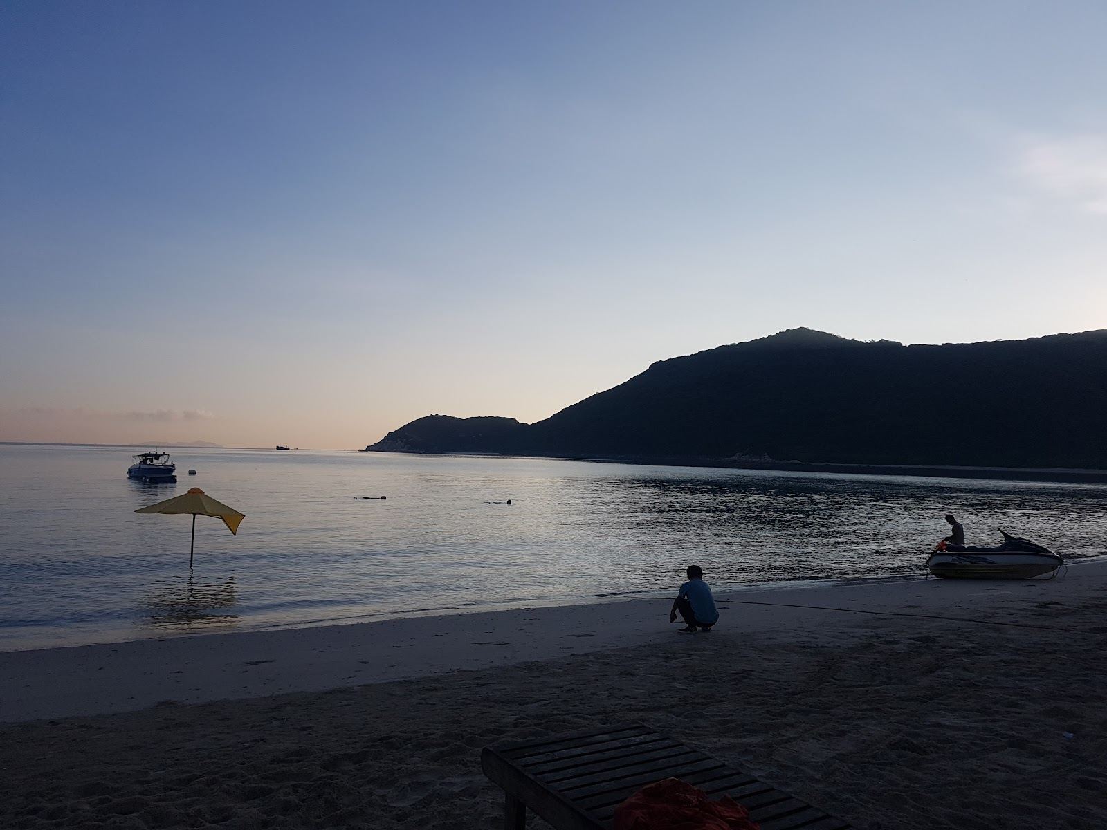 The white sand and calm clear water of Bai Tru beach on Hon Tre island at Nha Trang in Vietnam