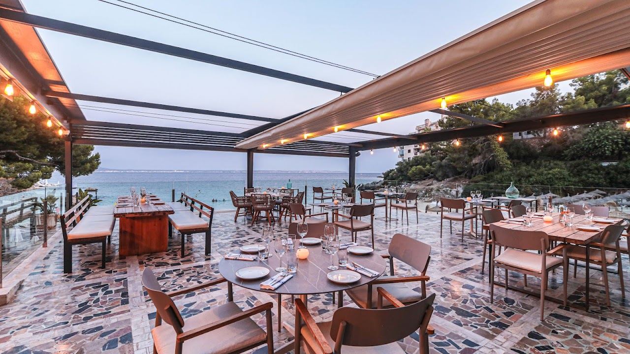 The Balneario beach club perched over the cove at Illetas on Mallorca