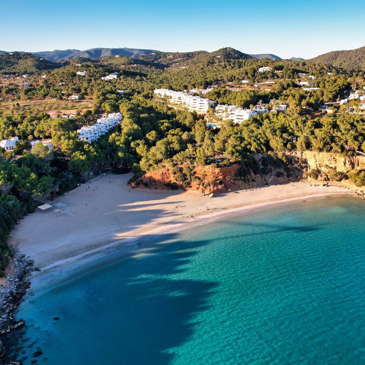 The broad shallow family beach at Cala Llenya on Ibiza