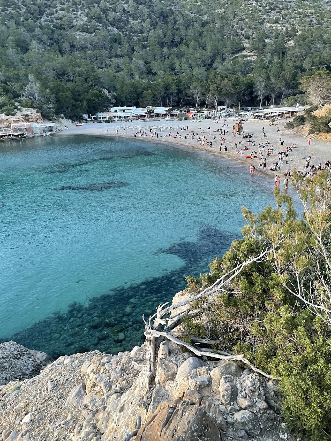 The rock formation and sunset crowd at Benirras beach on Ibiza