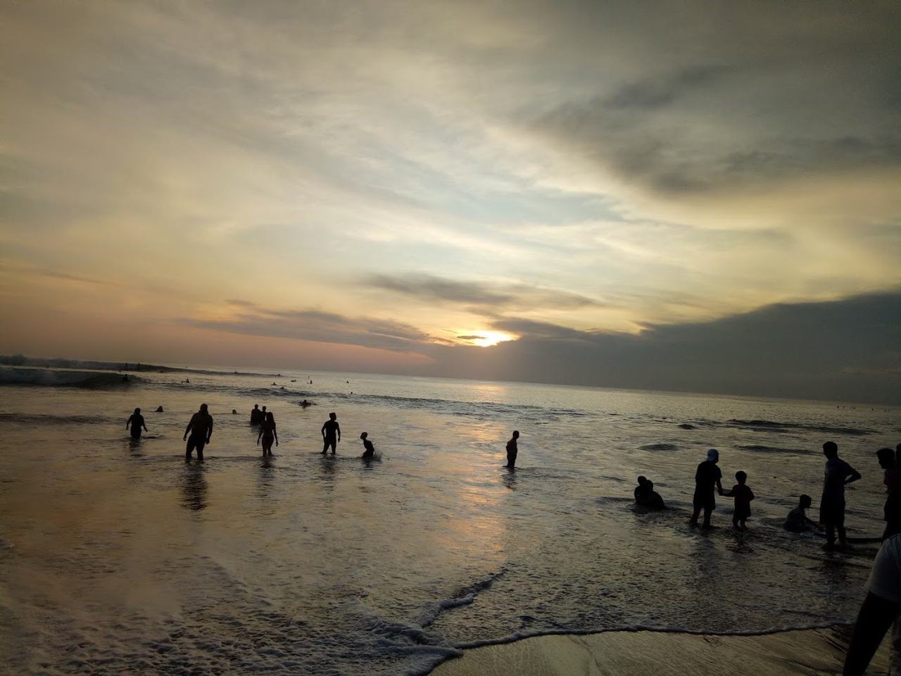 Cliffs and surf at Dreamland Beach in Bali