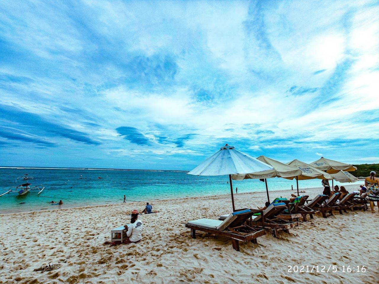 White sand and calm sea at Geger Beach in Bali
