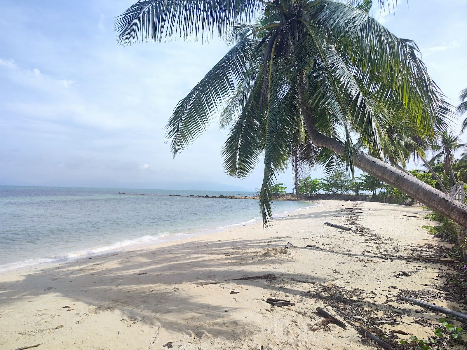 The long shallow reef sheltered bay of Ban Tai on the south coast of Koh Phangan