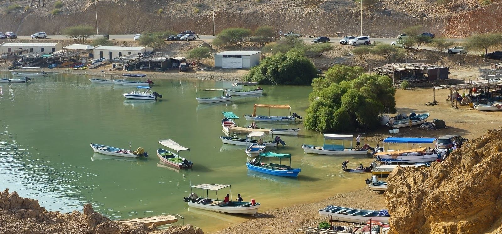 Protected turquoise coves and clear water at Bandar Khayran near Muscat