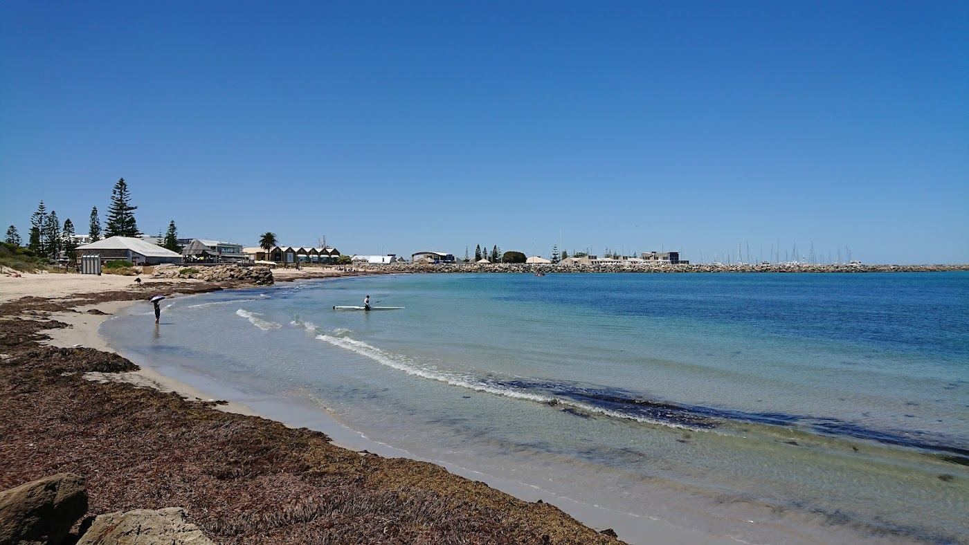 The small white sand cove of Bathers Beach below the historic Round House in Fremantle, Western Australia