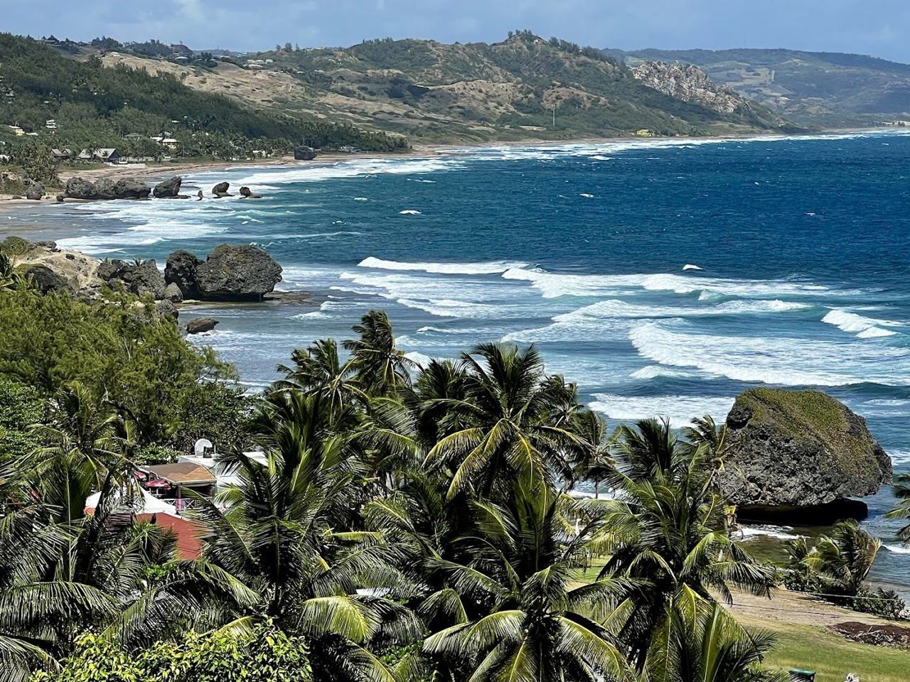 Giant weathered rocks and pounding Atlantic surf along the rugged Bathsheba shore on the east coast of Barbados