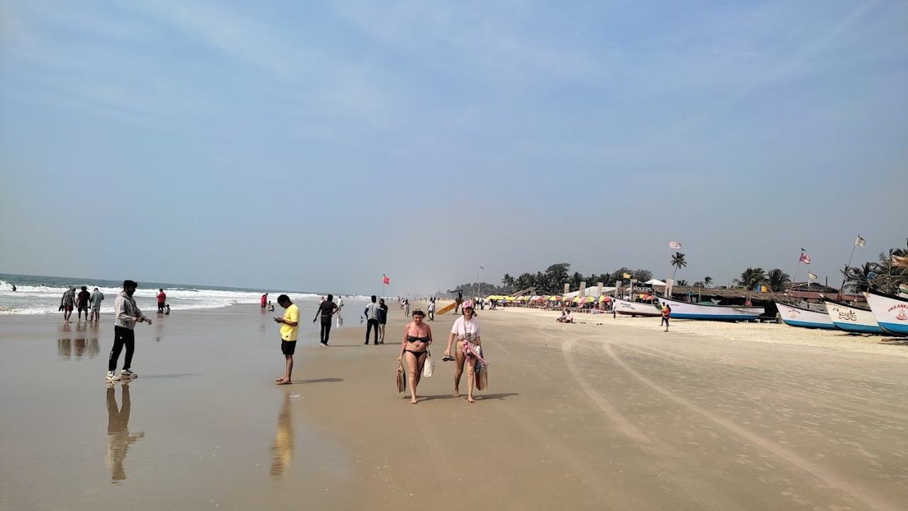 Benaulim Beach broad quiet sand and fishing boats in South Goa