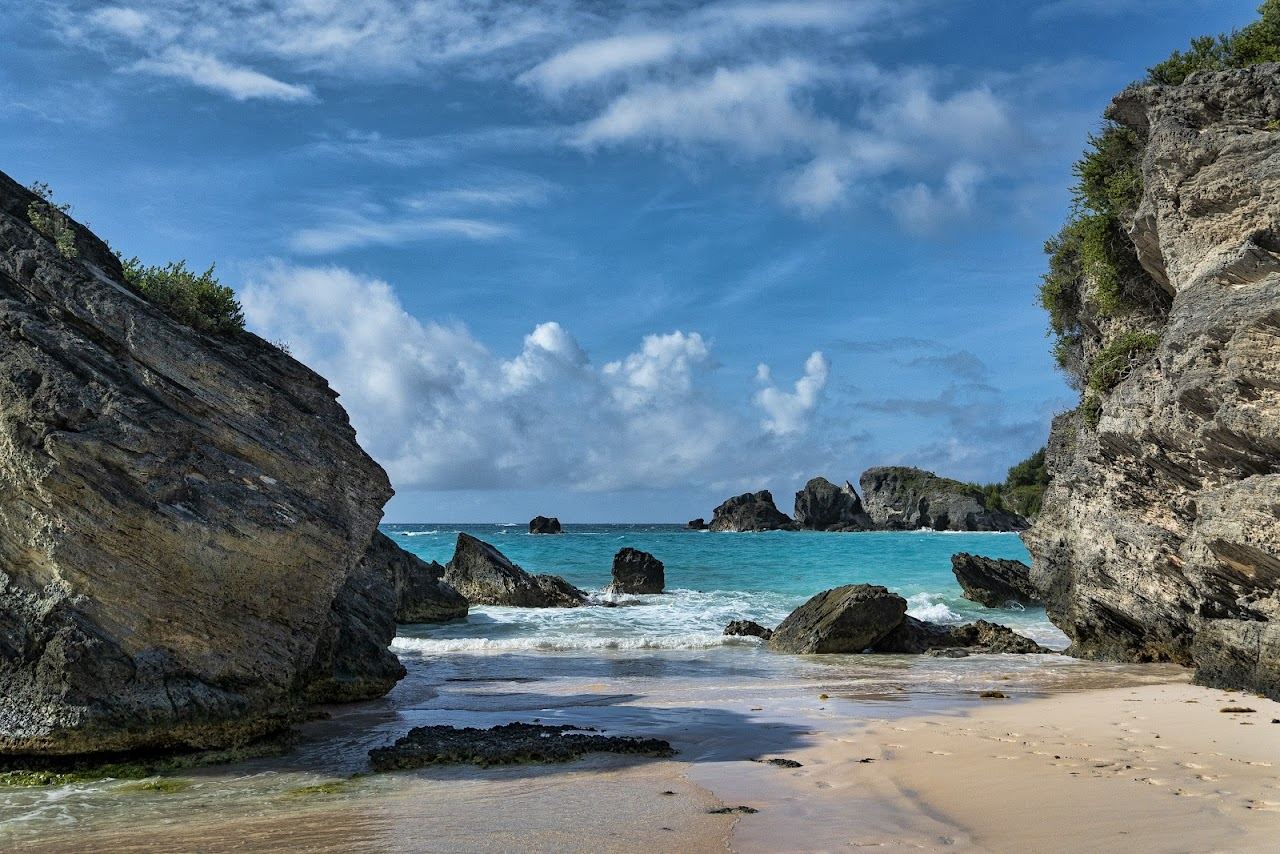 Pink sand, turquoise water and limestone outcrops at Horseshoe Bay on the south shore of Bermuda