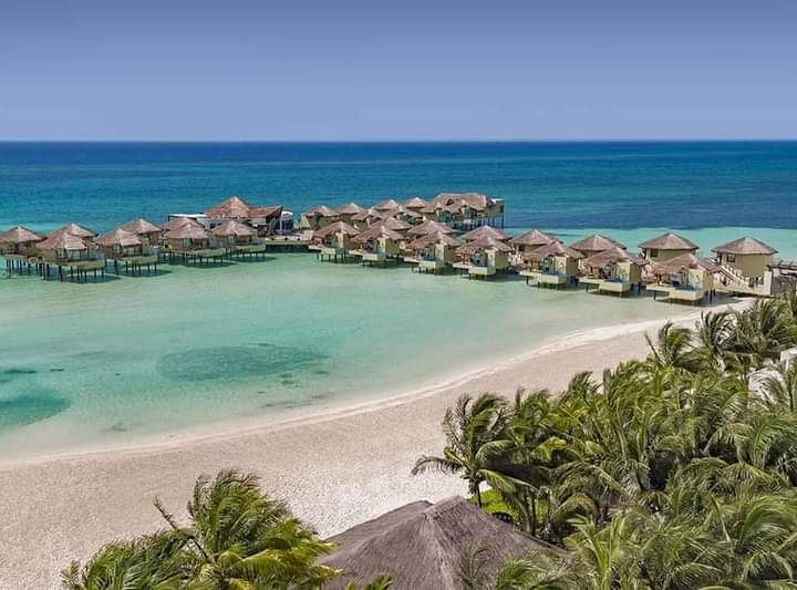 Powder sand and calm turquoise water at Playa Maroma on the Riviera Maya