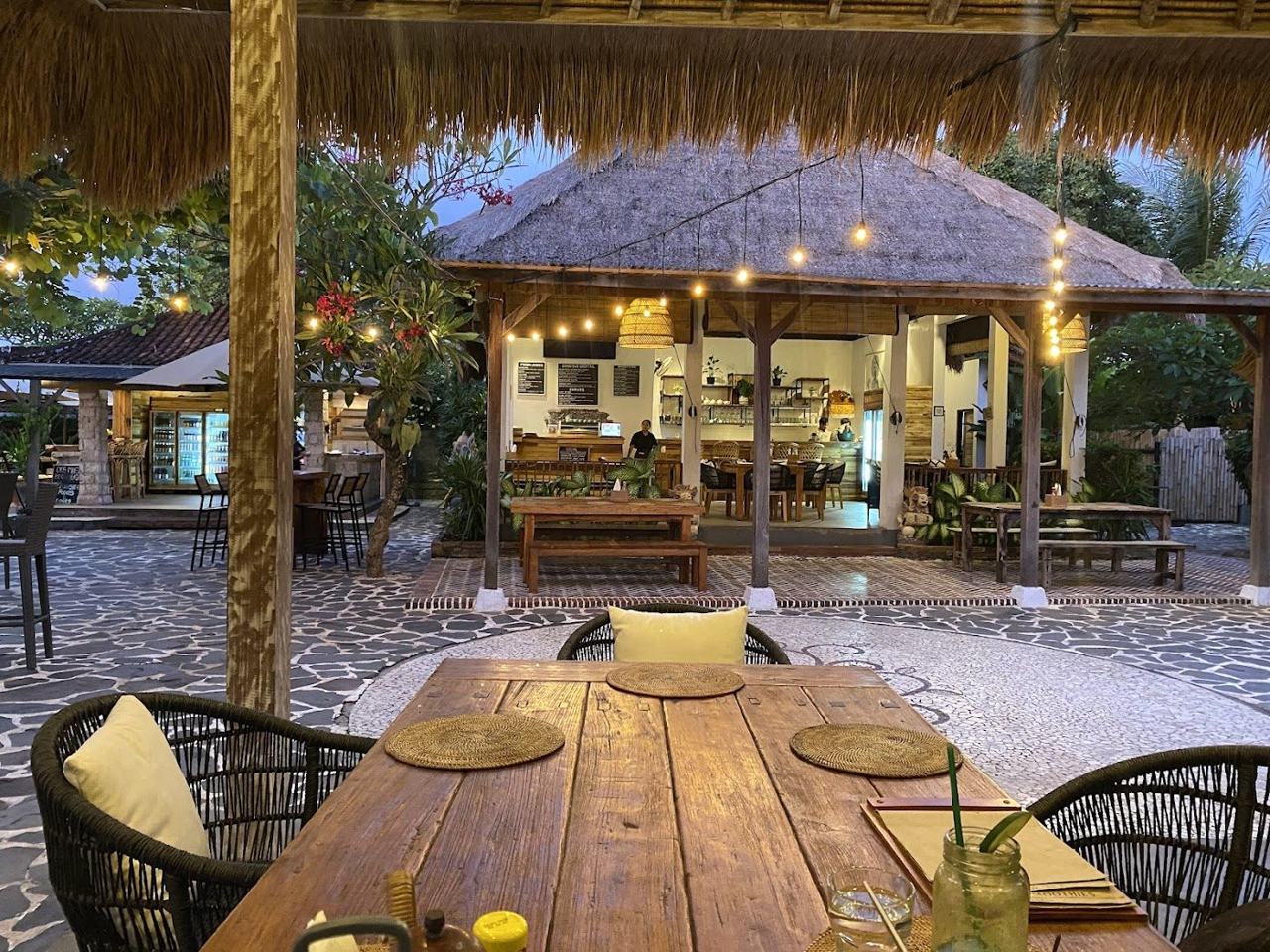 Garden seating at The Cashew Tree near Bingin Beach in Bali