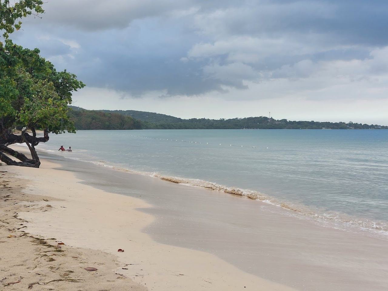 Bluefields Beach Westmoreland Jamaica calm shallow water and a shaded public beach park with local food stalls