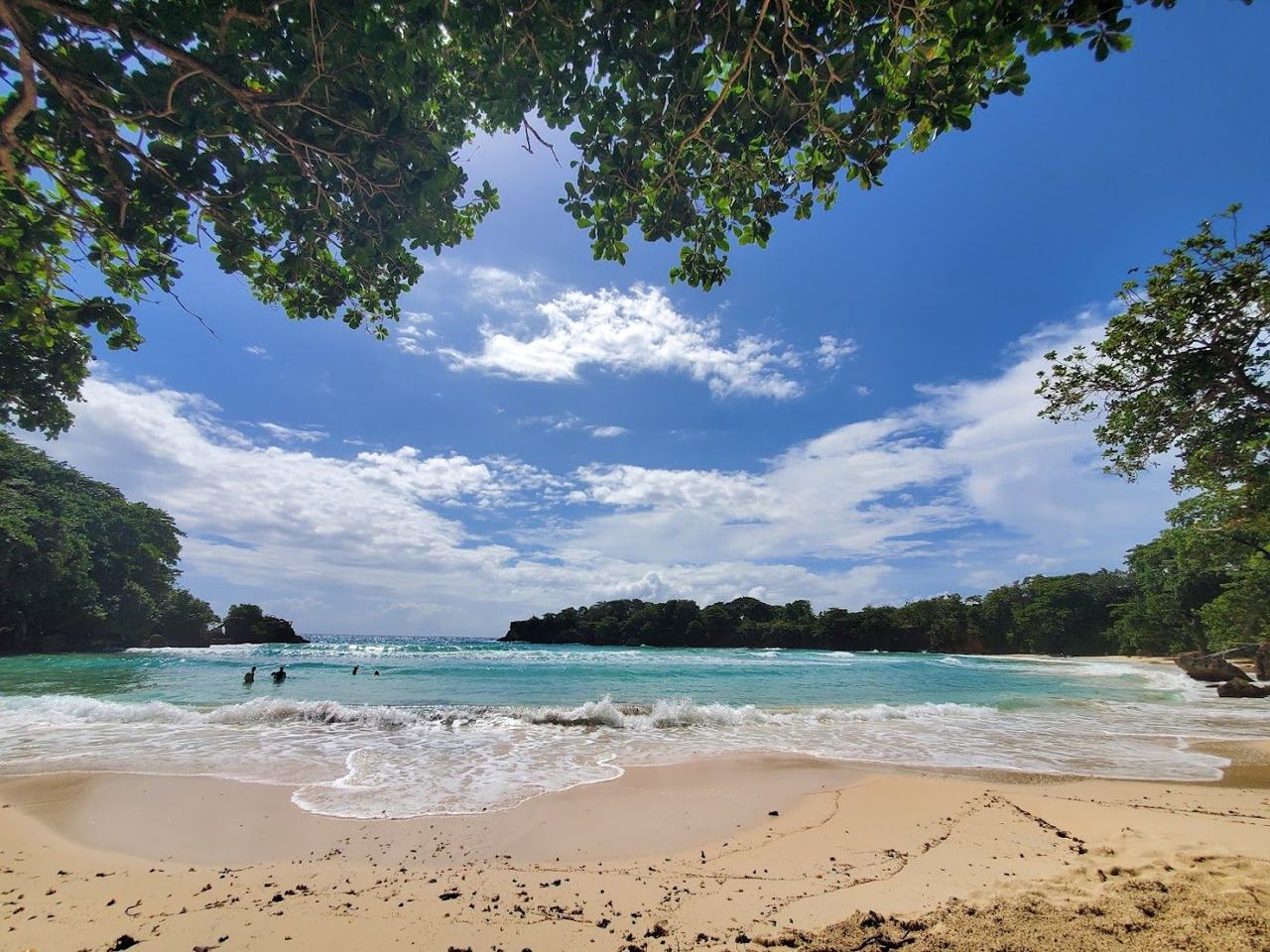 Boston Bay Port Antonio cream sand surf cove with jerk smoke rising near Port Antonio