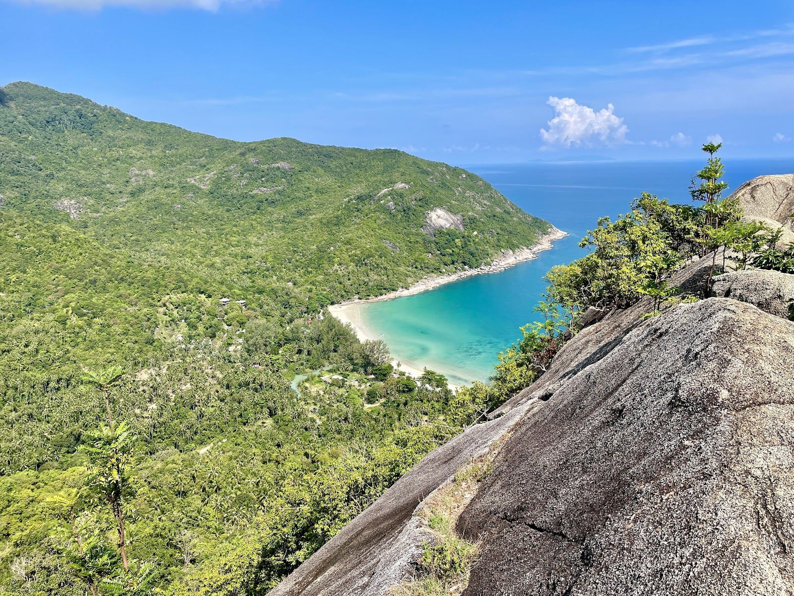 The clear sheltered water and jungle backed sand of Bottle Beach on the north coast of Koh Phangan