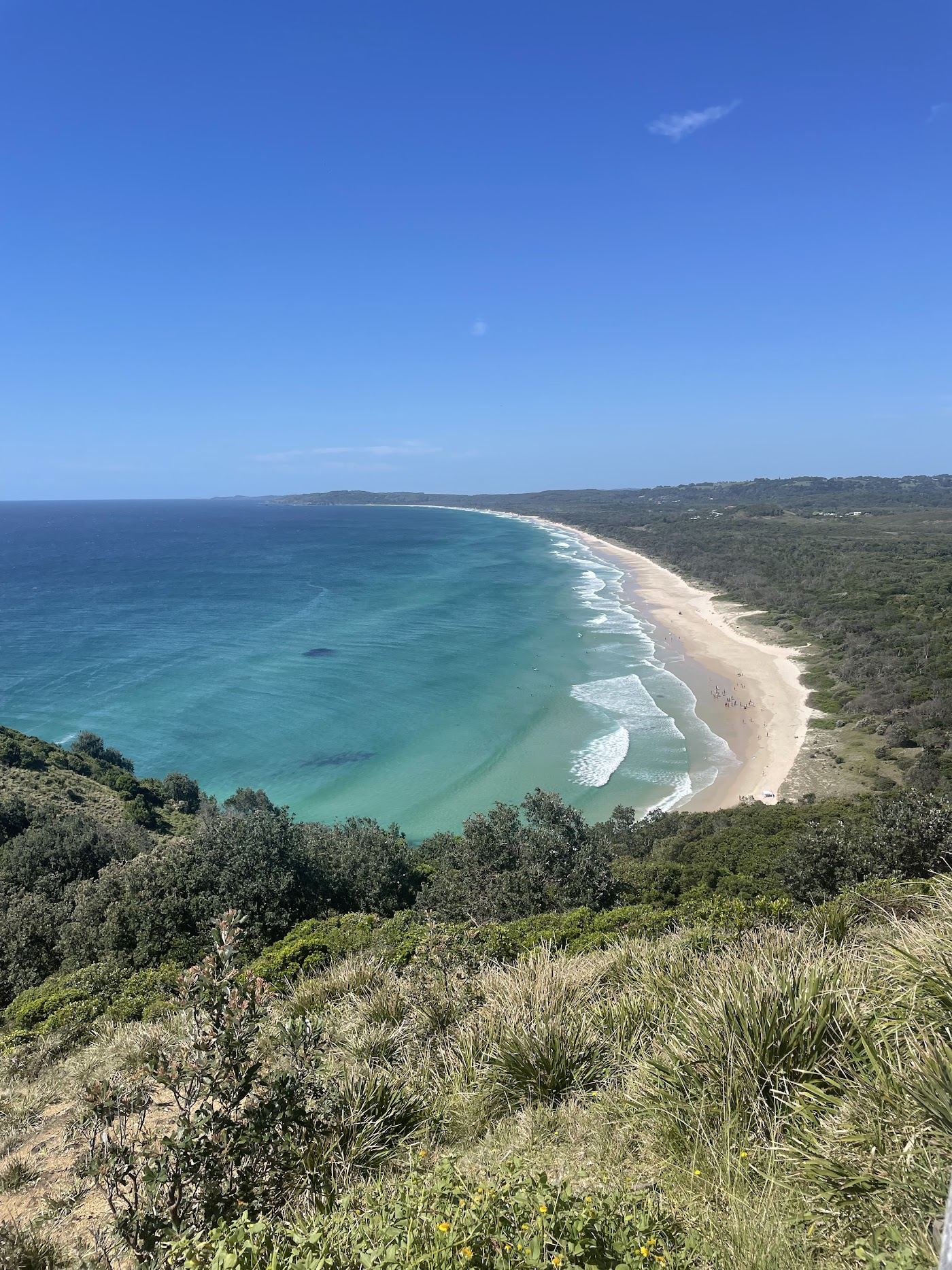 The sheltered sand and headland of Cosy Corner at the southern end of Tallow Beach in Byron Bay, New South Wales, Australia
