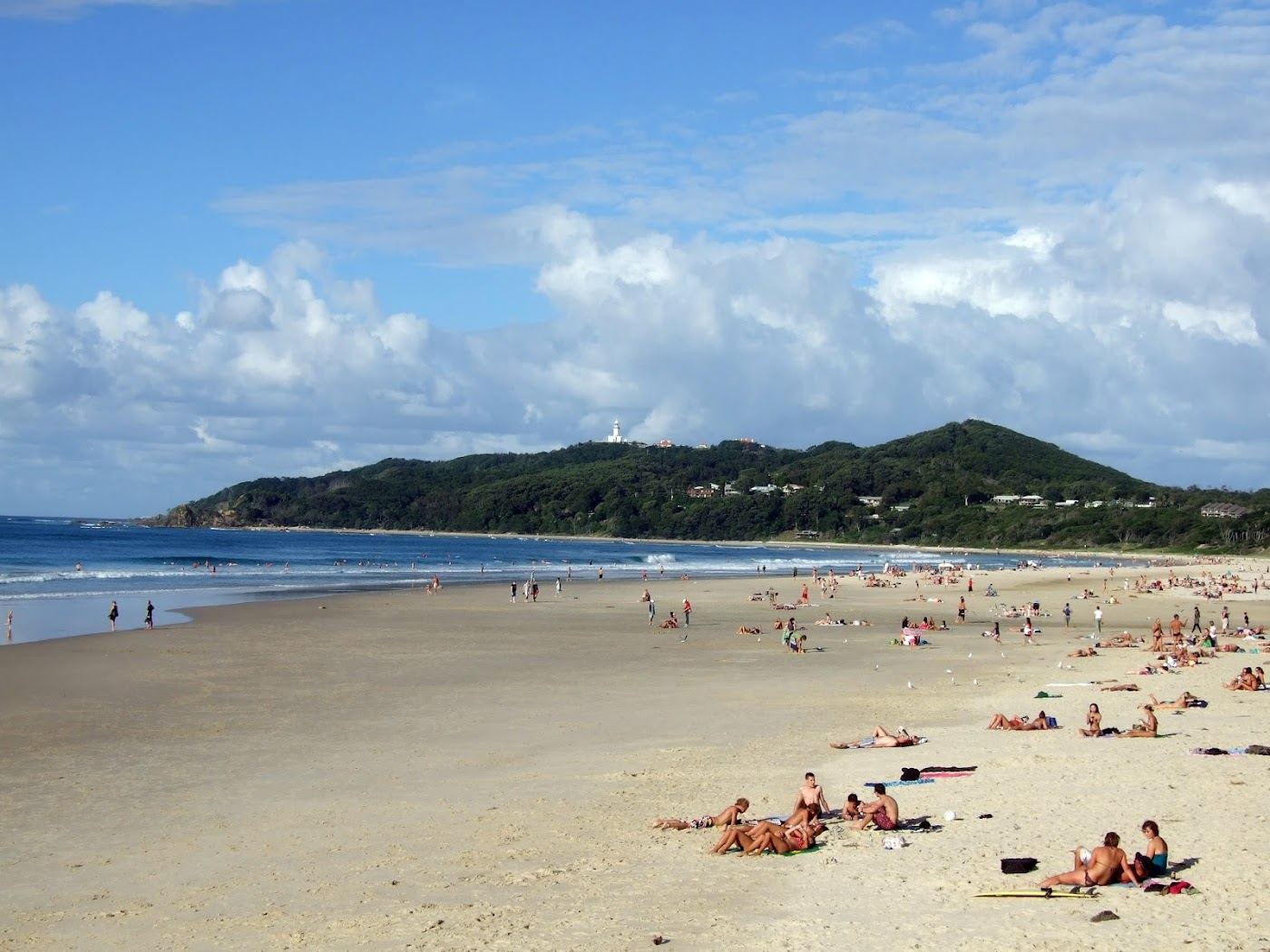 The curve of Main Beach and the bay at Byron Bay in New South Wales, Australia, with the cape beyond