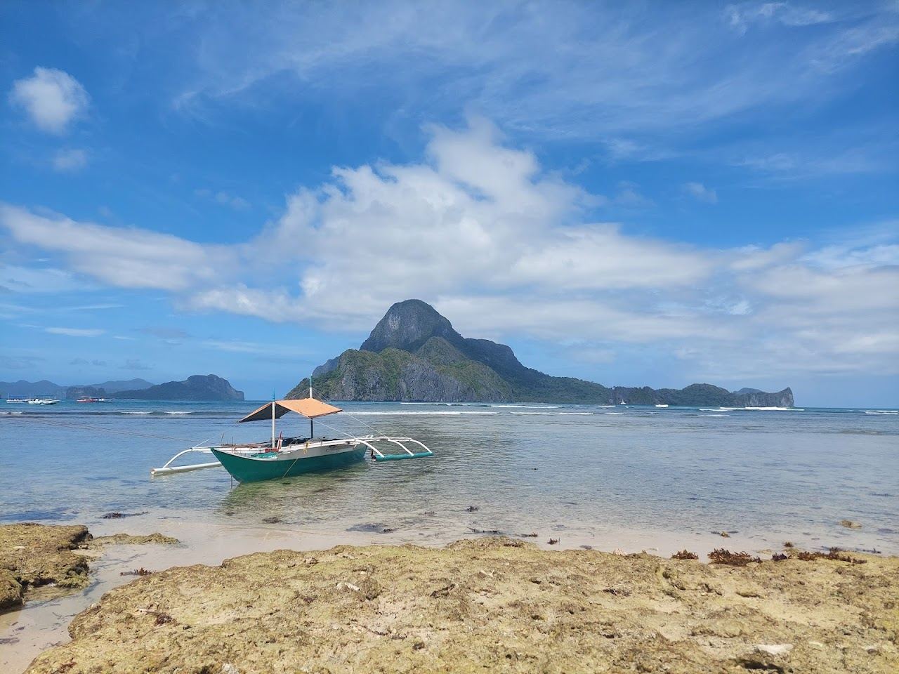 Caalan Beach quiet bay water and shoreline just north of El Nido town Palawan
