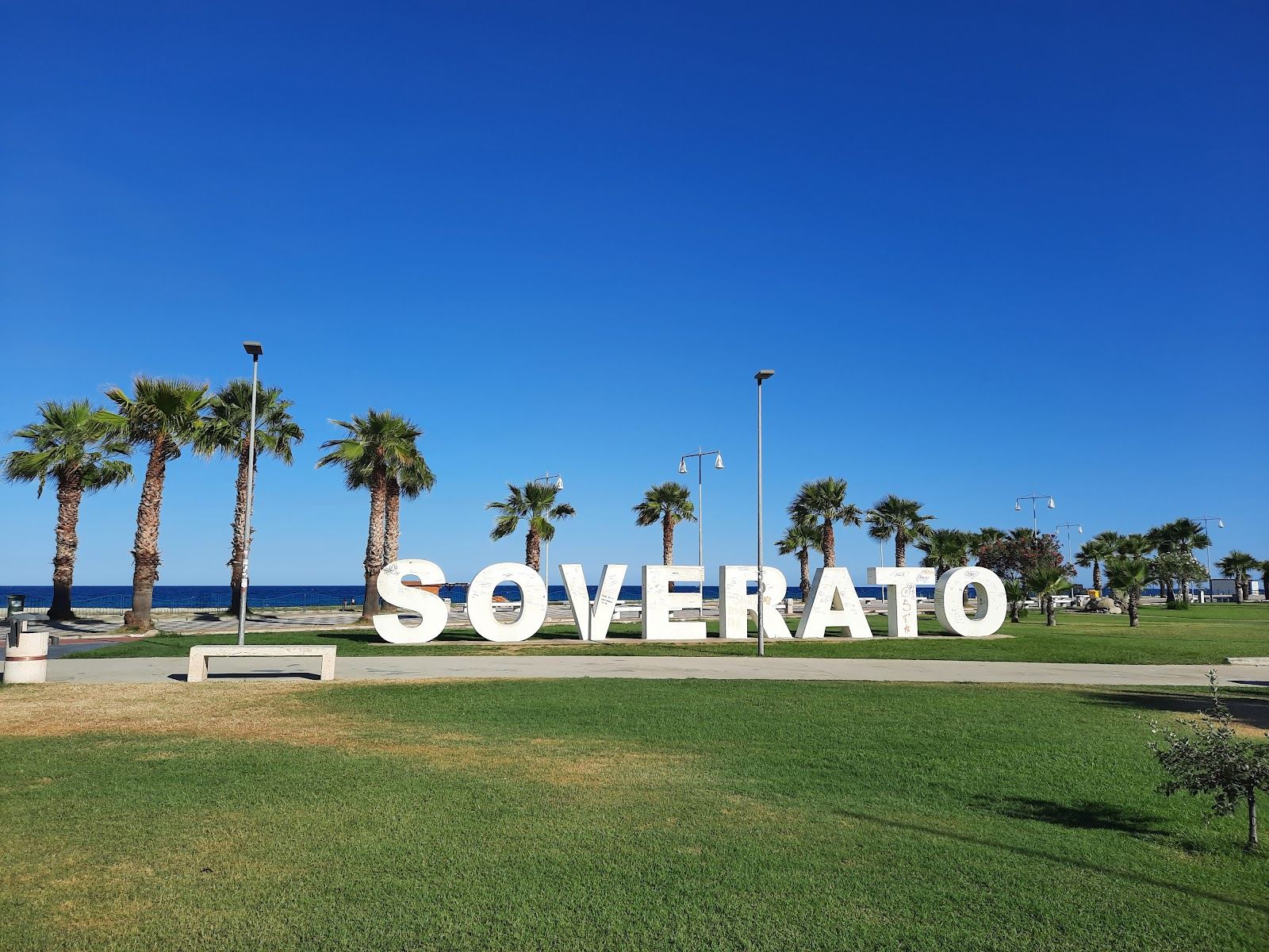 The long fine pale sand and calmer Ionian water at Soverato in Calabria, an easy family beach