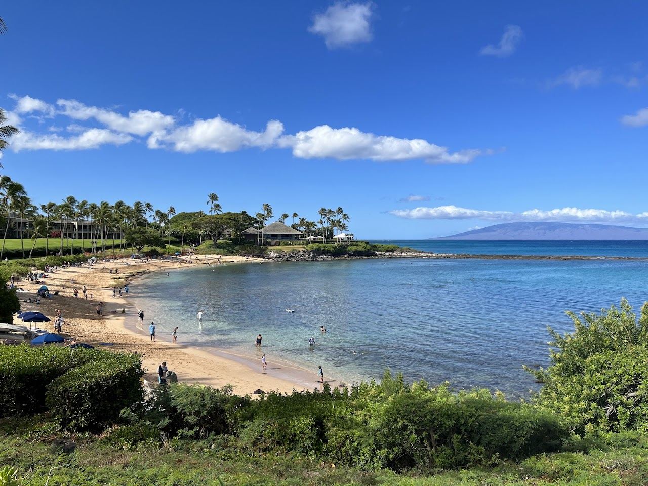 The protected crescent and calm snorkel water of Kapalua Bay on Maui