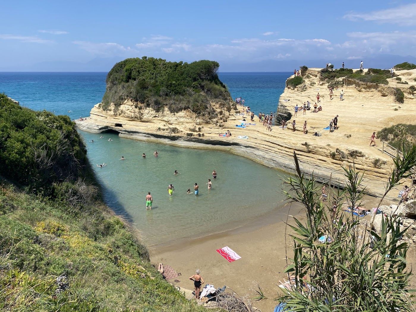 Carved sandstone fingers and clear coves at the Canal d'Amour, Sidari, Corfu