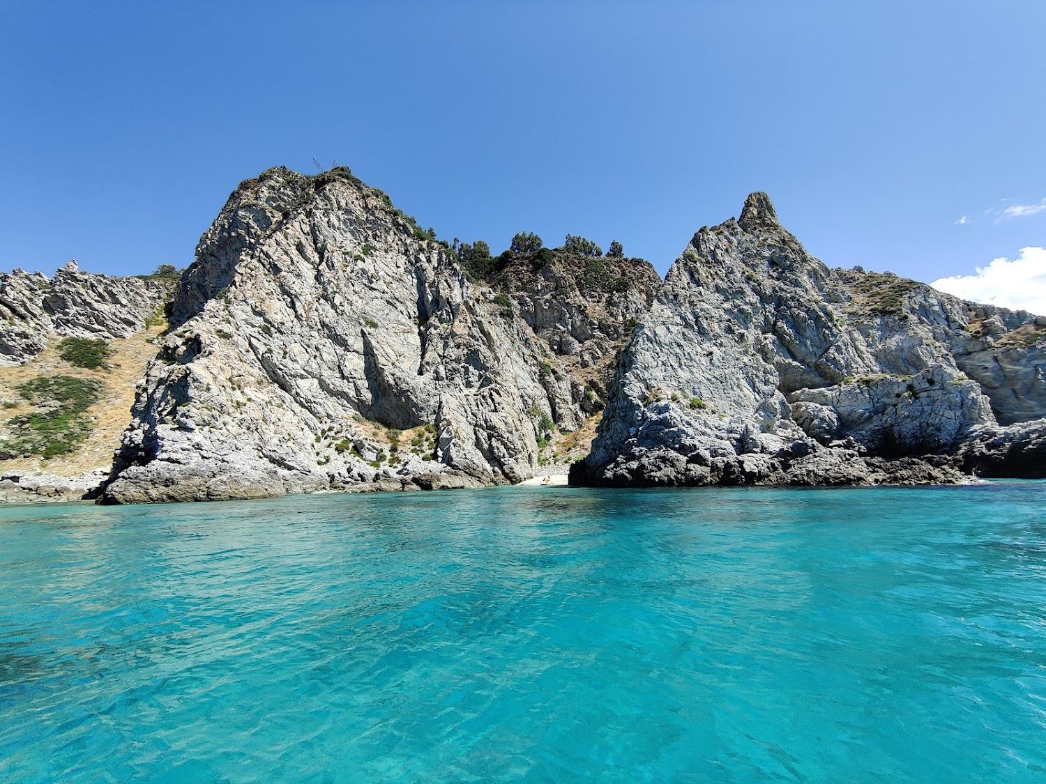 Clifftop coves and clear water at Capo Vaticano in Calabria