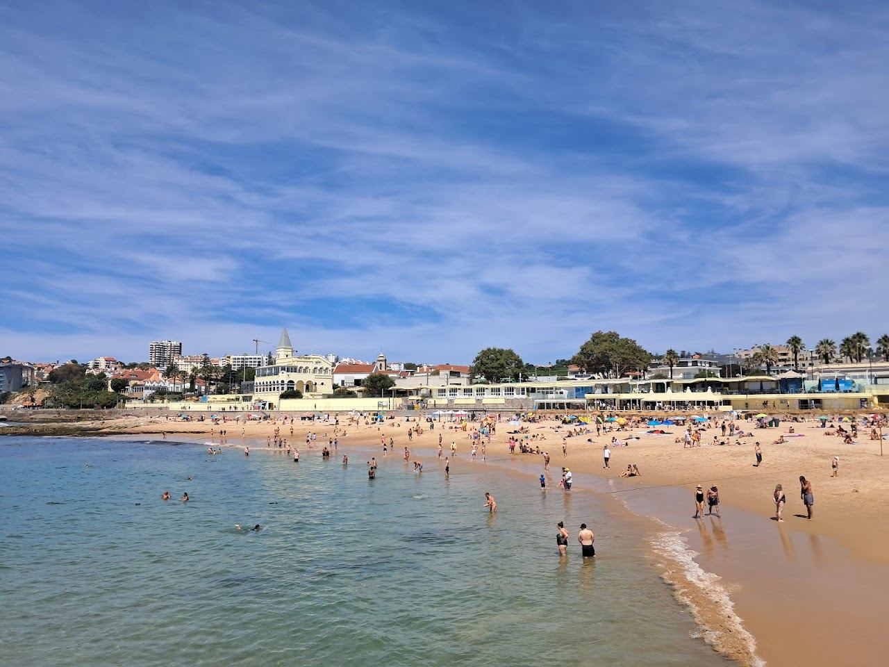 Calm sheltered water and breakwater at Praia do Tamariz in Estoril