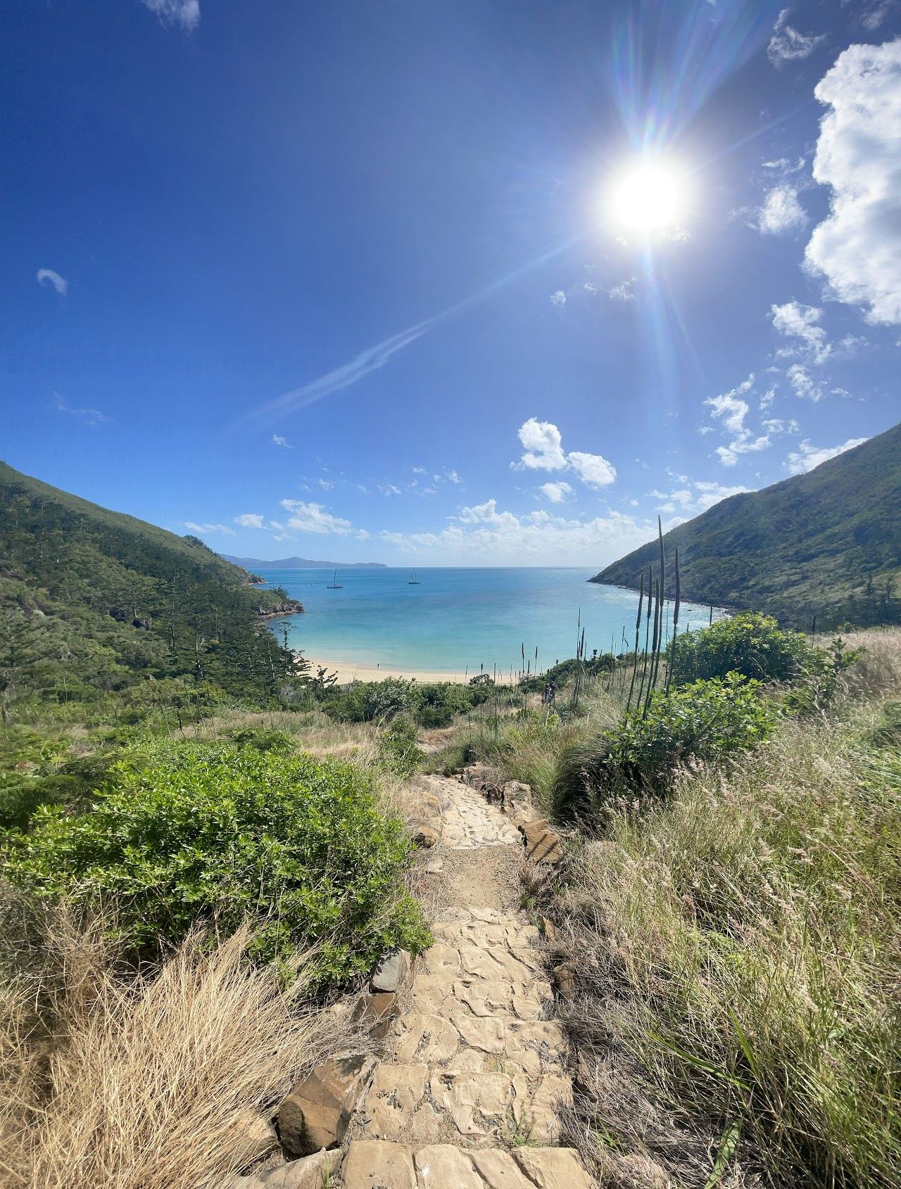 Secluded sandy beach and clear water at Cateran Bay on Border Island in the Whitsundays