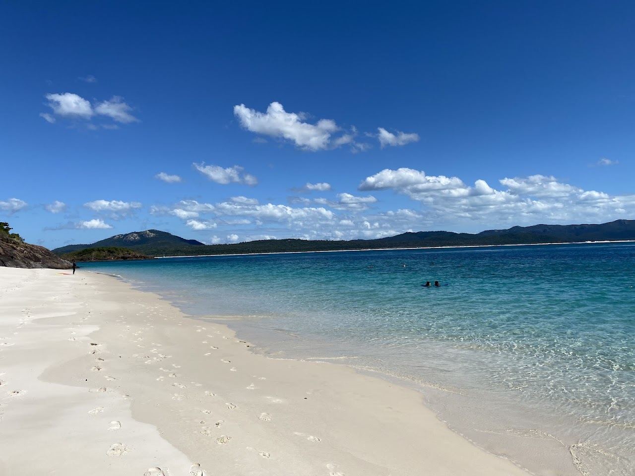 White silica sand and clear blue water at Chalkies Beach on Haslewood Island in the Whitsundays