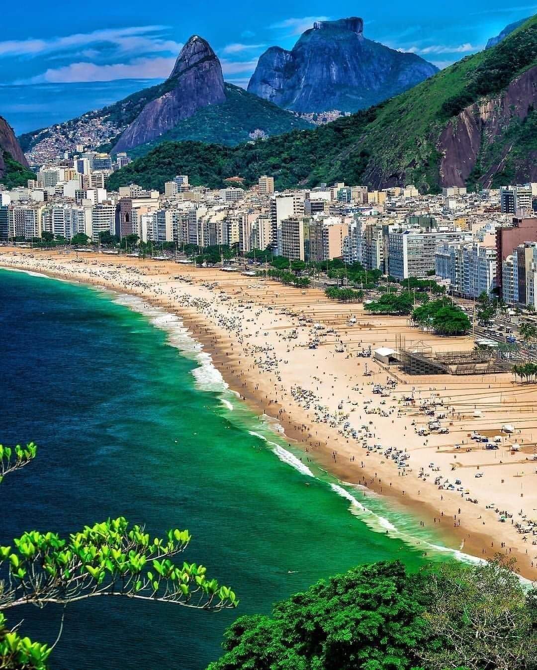 The long crescent of Copacabana Beach below the hills of Rio de Janeiro