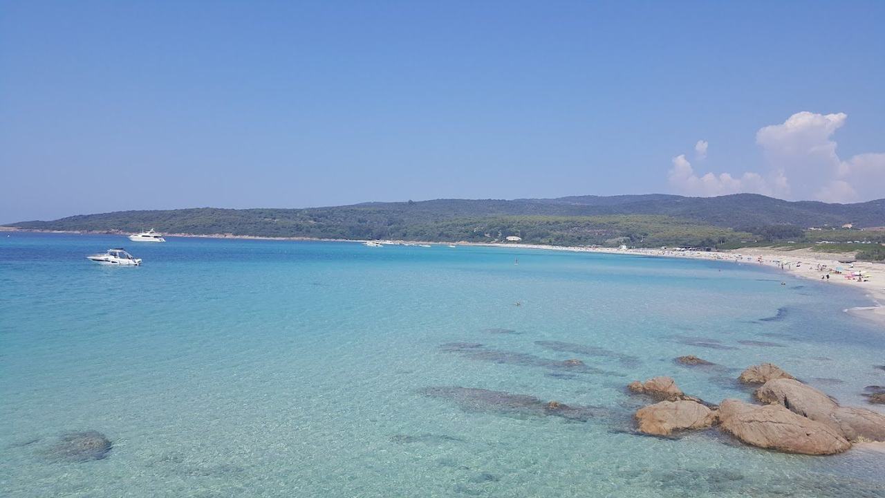 Surf rolling into the wild open beach of Capo di Feno west of Ajaccio in Corsica