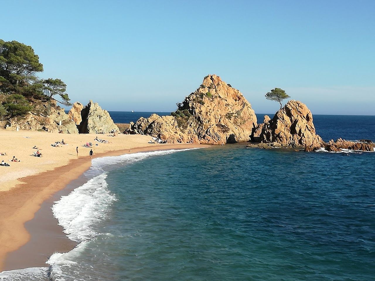The beach and medieval old town walls at Tossa de Mar on the Costa Brava