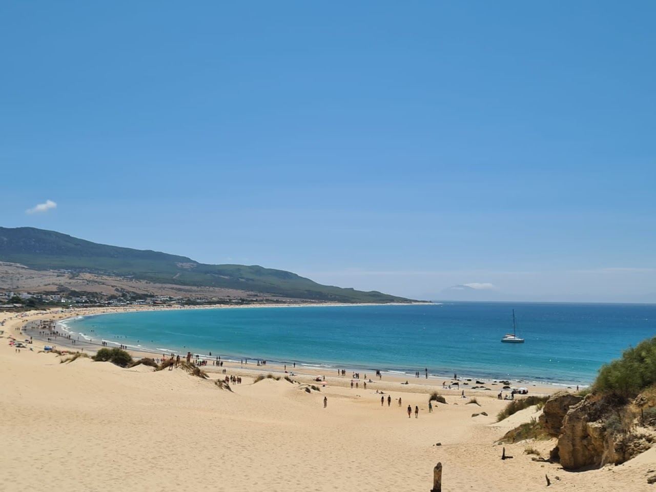 Wide pale sand, dunes and Atlantic surf at Bolonia on the Costa de la Luz in Cadiz Spain