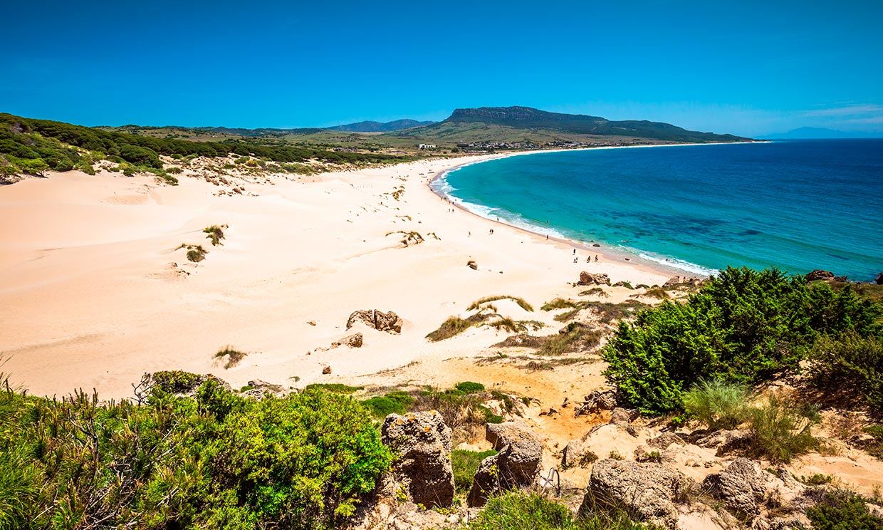 The wild dune and pale sand at Bolonia beach near Tarifa on the Costa de la Luz at golden hour