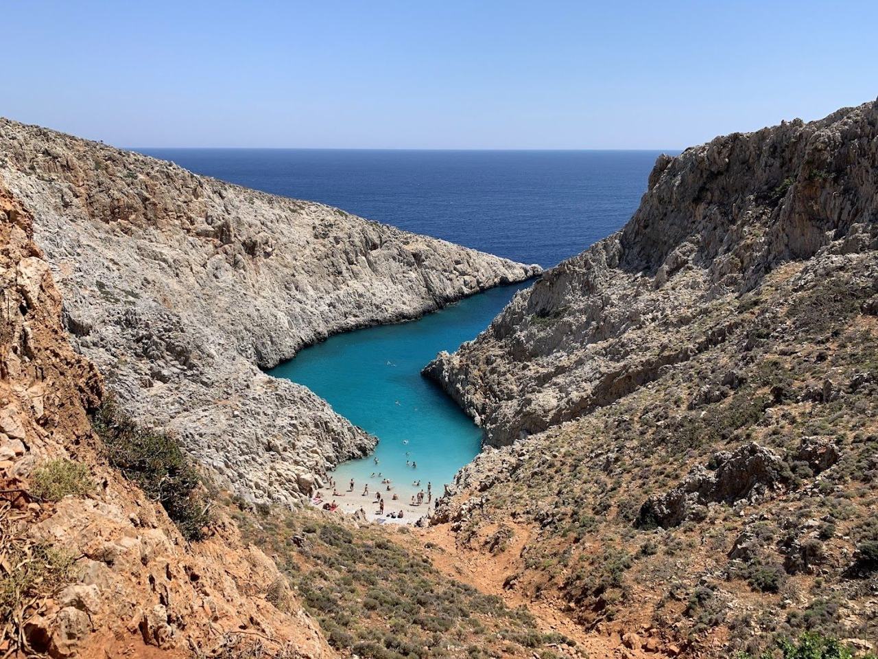 Turquoise water in the steep hidden cove at Seitan Limania on Crete