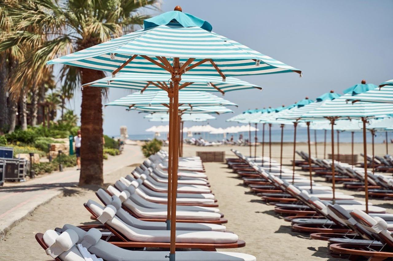 Beachfront day beds and dining at a Limassol beach club on the south coast of Cyprus