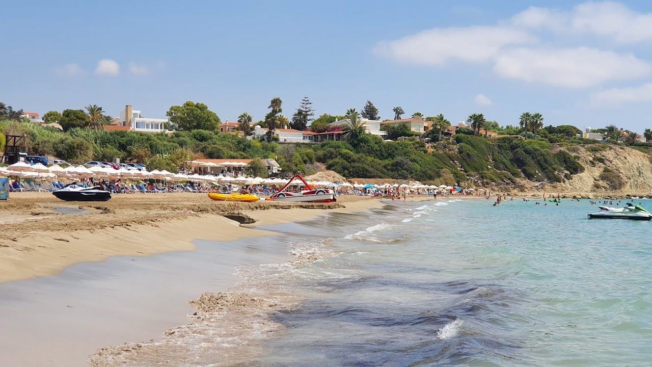 The sandy bay and clear water at Coral Bay near Paphos, a popular diving beach in Cyprus