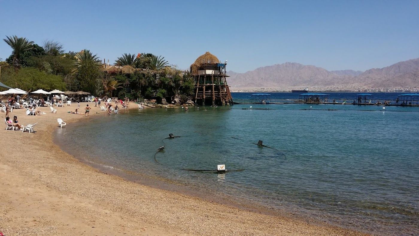 The calm dolphin bay and wooden piers at Dolphin Reef in Eilat