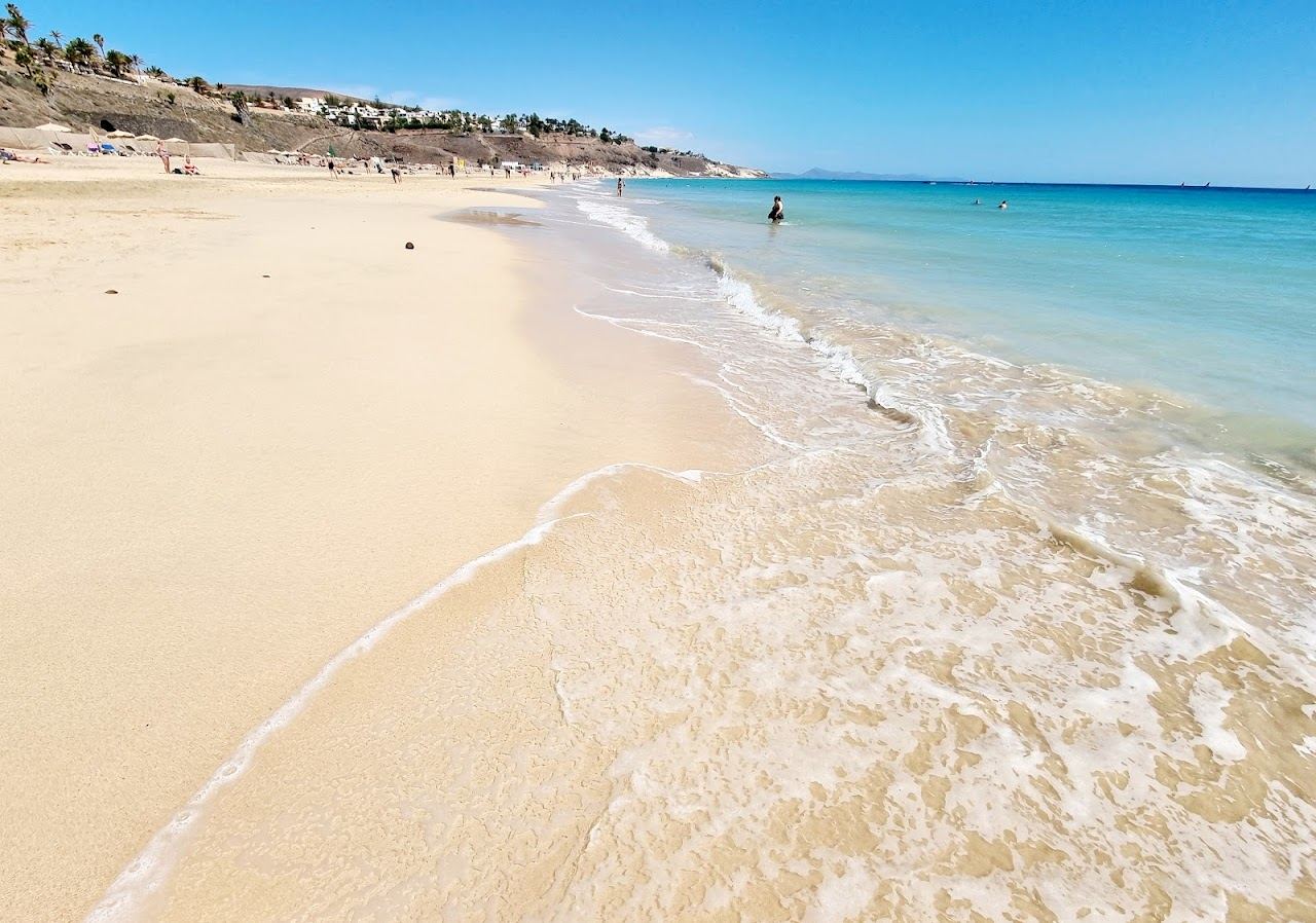 Long quiet golden sand beach and calm shallow water at Playa de Esquinzo and Butihondo on the Jandia coast of Fuerteventura
