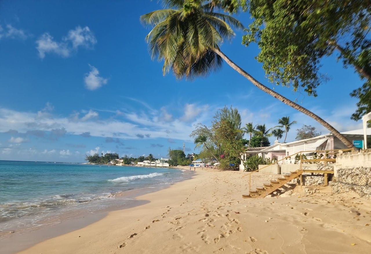 The calm west coast water and soft sand of Mullins beach in Barbados