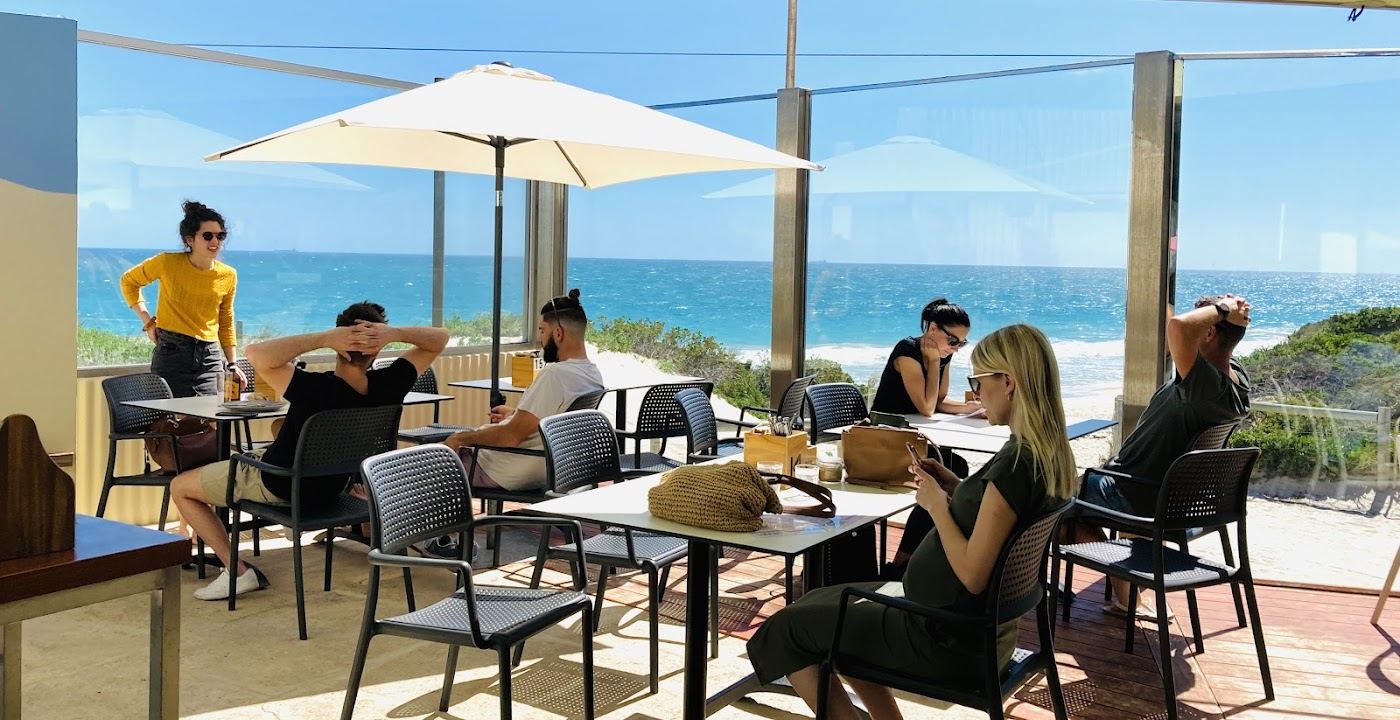 The kiosk and grassed foreshore behind Floreat Beach in Perth