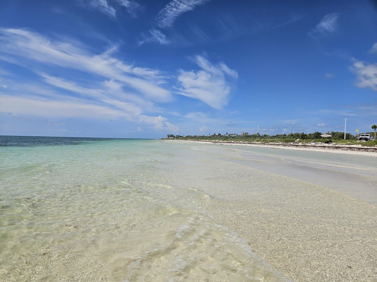 A quiet empty stretch of soft sand at Sandspur Beach in Bahia Honda in the Florida Keys